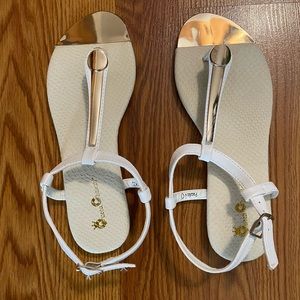 White and Gold T Strap Sandals.